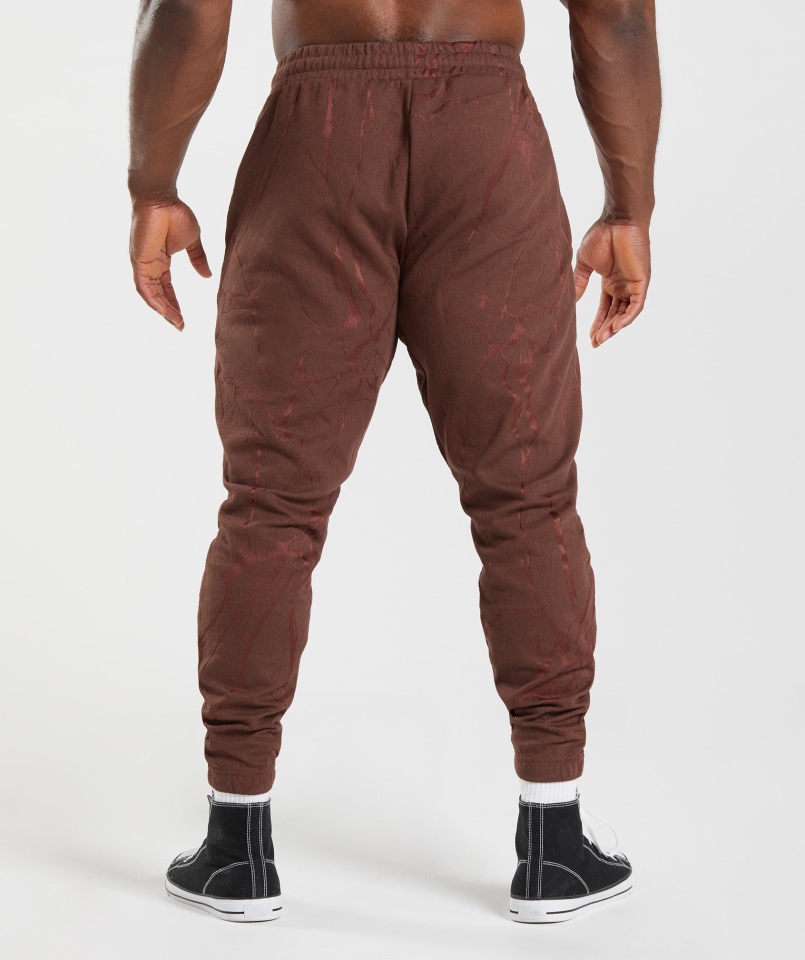 Gymshark Power Joggers Wiśniowy Brązowy Nadruk