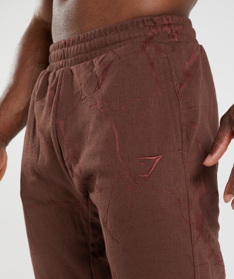 Gymshark Power Joggers Wiśniowy Brązowy Nadruk