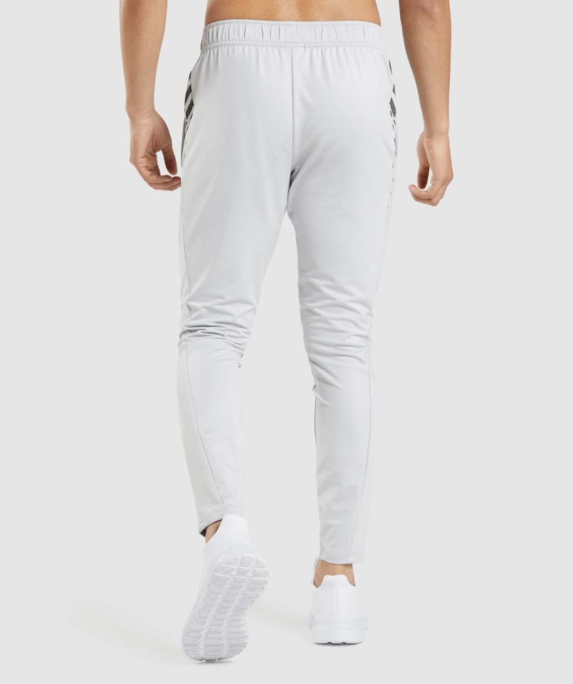 Gymshark Sportowe Spodnie W Paski Jasnoszare