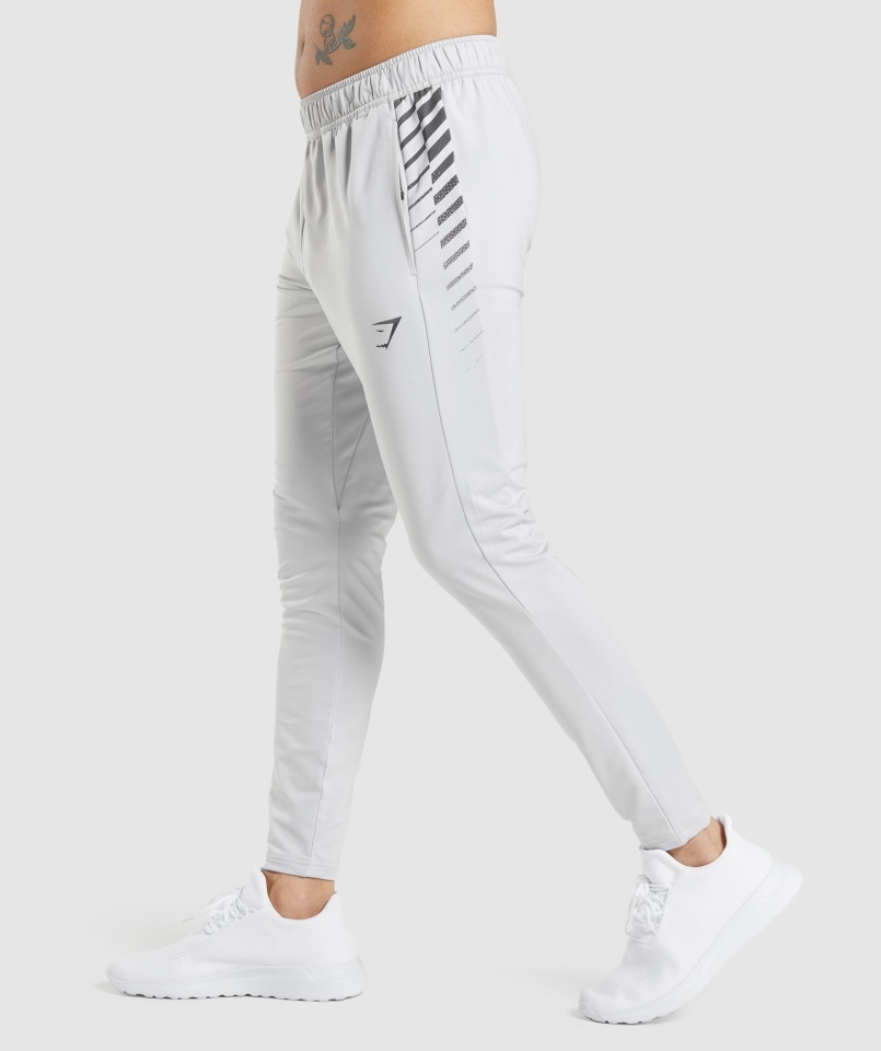 Gymshark Sportowe Spodnie W Paski Jasnoszare