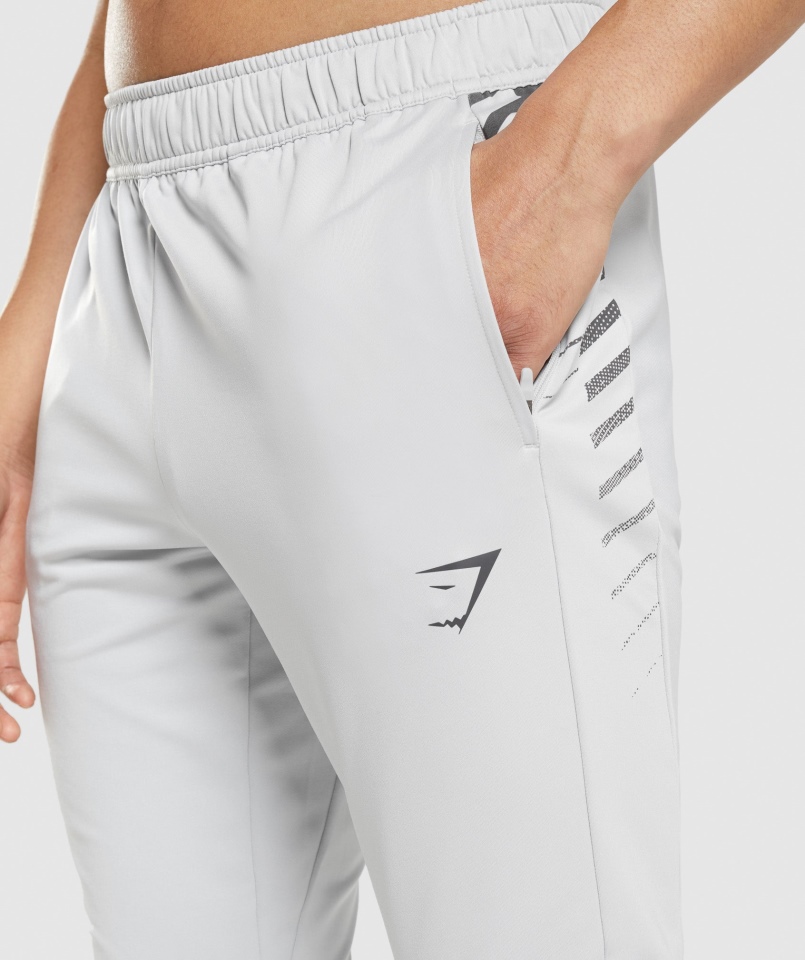 Gymshark Sportowe Spodnie W Paski Jasnoszare