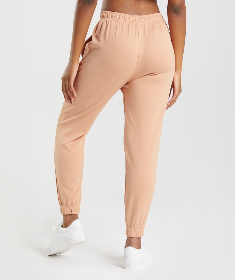 Gymshark Whitney Luźne Joggery Zachód Słońca Beż